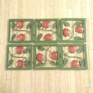 A Set of 6 Apple Design Metal Trivets